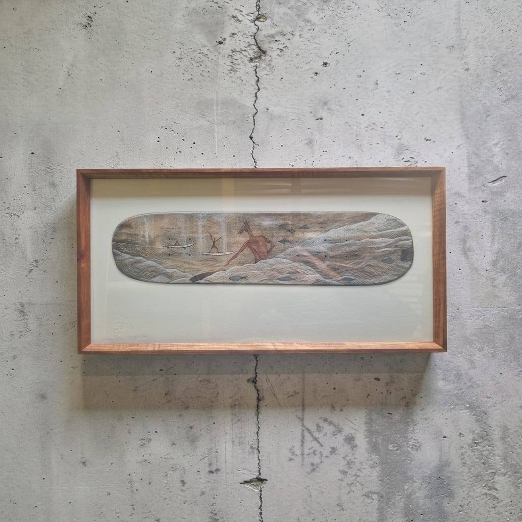 Salon wall of varied artworks in bespoke frames