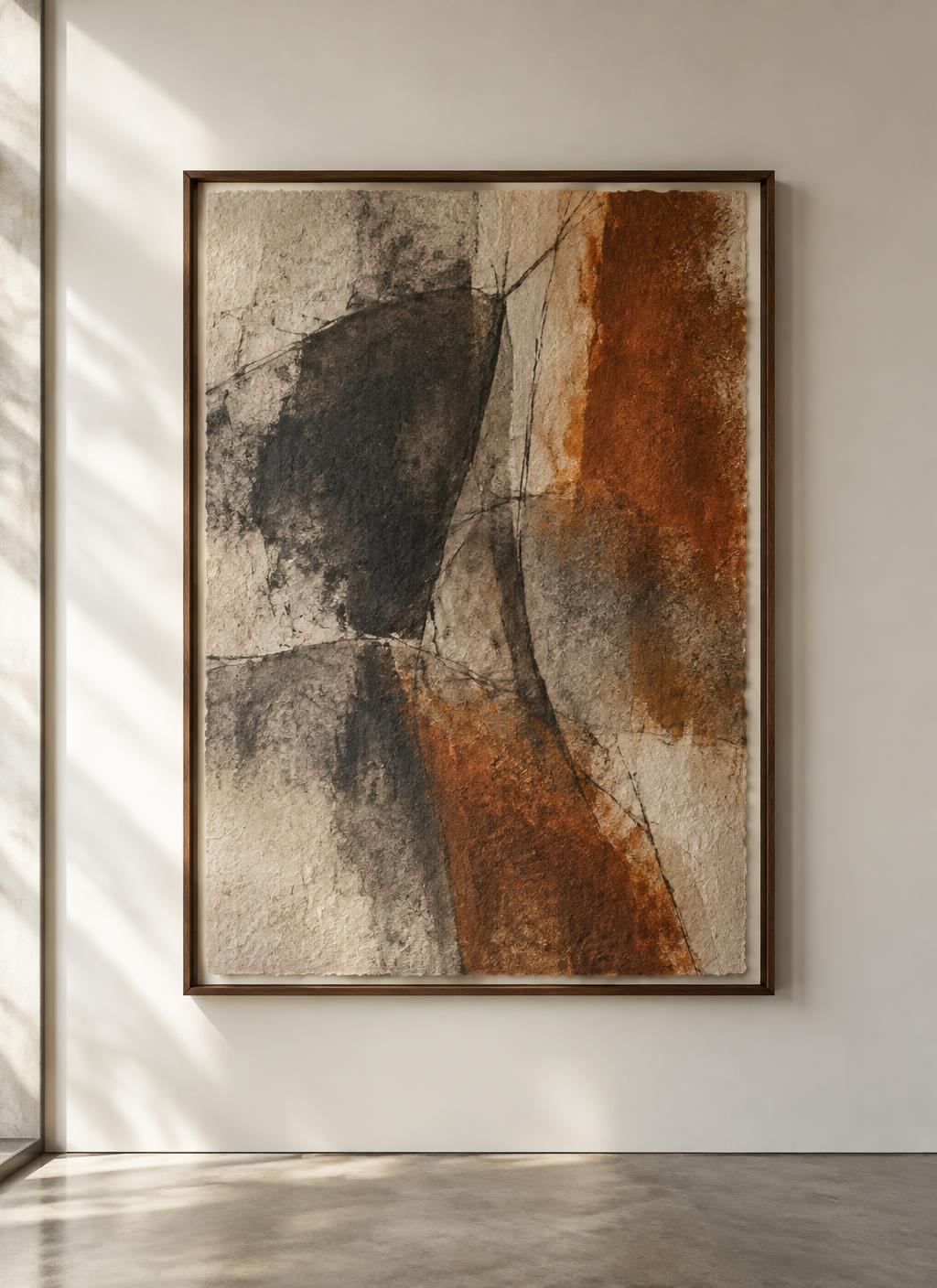 Abstract charcoal and rust artwork in a slender walnut shadow-gap frame